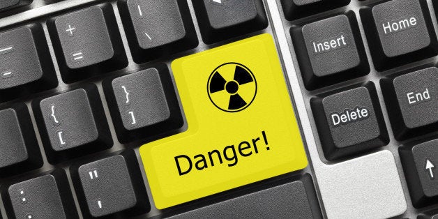 Close-up view on conceptual keyboard - Danger (yellow key with radiation symbol)