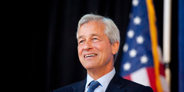 Jamie Dimon, chairman and chief executive officer of JPMorgan Chase & Co., smiles while speaking at the Detroit Economic Club in Detroit, Michigan, U.S., on Thursday, Sept. 17, 2015. Dimon broke with the prediction of his bank's top U.S. economist, saying the Federal Reserve probably will hold off Thursday on boosting interest rates. Photographer: Laura McDermott/Bloomberg via Getty Images 