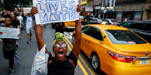 NEW YORK, NY - JULY 8: People take part in a protest on July 8, 2016 in New York City. Police presence was increased around N