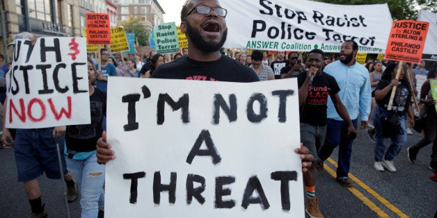 Demonstrators with Black Lives Matter march during a protest in Washington, U.S., July 9, 2016. REUTERS/Joshua Roberts