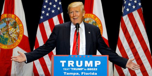 Republican U.S. presidential candidate Donald Trump gestures during a campaign rally in Tampa, Florida, U.S. June 11, 2016. REUTERS/Scott Audette/File Photo