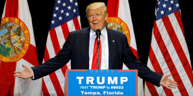 Republican U.S. presidential candidate Donald Trump gestures during a campaign rally in Tampa, Florida, U.S. June 11, 2016. R
