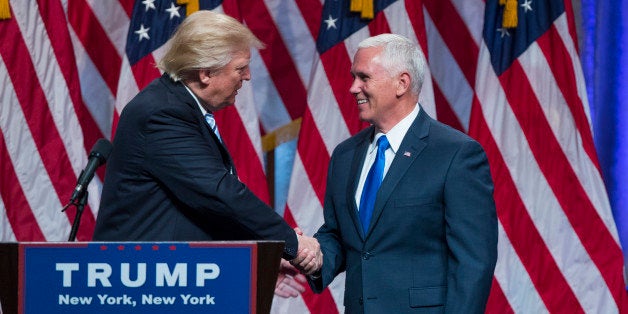 Republican presidential candidate Donald Trump, right, introduces Gov. Mike Pence, R-Ind., during a campaign event to announce Pence as the vice presidential running mate on, Saturday, July 16, 2016, in New York. (AP Photo/Evan Vucci)