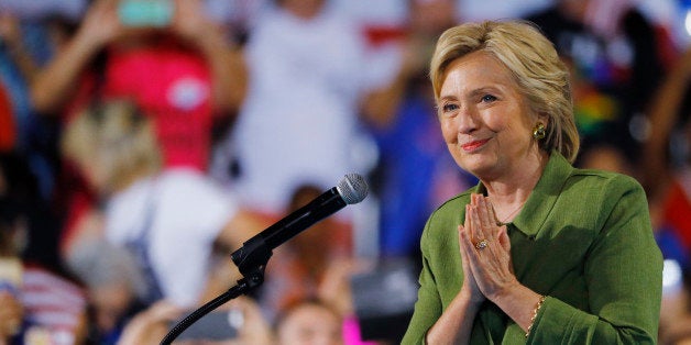 U.S. Democratic presidential candidate Hillary Clinton takes the stage at a campaign rally in Tampa, Florida, U.S. July 22, 2016. REUTERS/Scott Audette