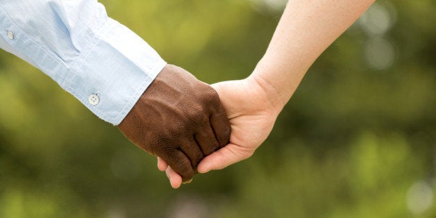 Happy Interracial Couple. African American man and a Caucasian woman.