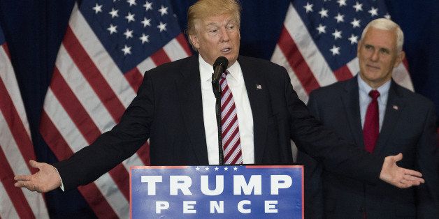 Donald Trump, 2016 Republican presidential nominee, left, speaks as Mike Pence, 2016 Republican vice presidential nominee, during a goodbye reception at the Westin Hotel in Cleveland, Ohio, U.S., on Friday, July 22, 2016. A day after accepting the Republican presidential nomination in a speech that signaled a more serious turn heading into the general election, Donald Trump ripped into former primary competitor Ted Cruz, revisiting their ugly feud over Cruzs wife and father. Photographer: Ty Wright/Bloomberg via Getty Images