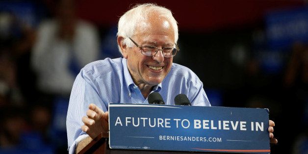 Democratic U.S. presidential candidate Bernie Sanders smiles during a campaign rally in Santa Cruz, California, U.S., May 31, 2016. REUTERS/Stephen Lam