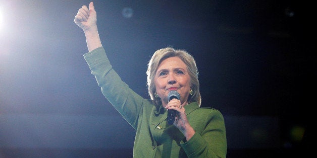 U.S. Democratic presidential candidate Hillary Clinton reacts to the crowd while speaking at a campaign rally in Tampa, Florida, U.S. July 22, 2016. REUTERS/Brian Snyder TPX IMAGES OF THE DAY