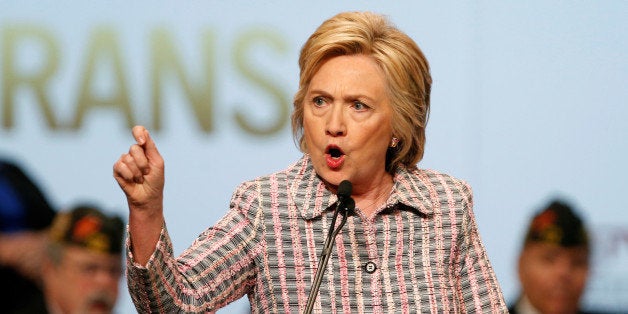 U.S. Democratic presidential candidate Hillary Clinton gestures as she speaks at the Veterans of Foreign Wars Convention in Charlotte, North Carolina, U.S. July 25, 2016. REUTERS/Chris Keane