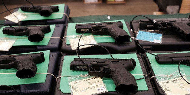 FORT WORTH, TX - JULY 10: Guns sit for sale at a gun show where thousands of different weapons are displayed for sale on July 10, 2016 in Fort Worth, Texas. The Dallas and Forth Worth areas are still mourning the deaths of five police officers last Thursday evening by a lone gunman. (Photo by Spencer Platt/Getty Images)