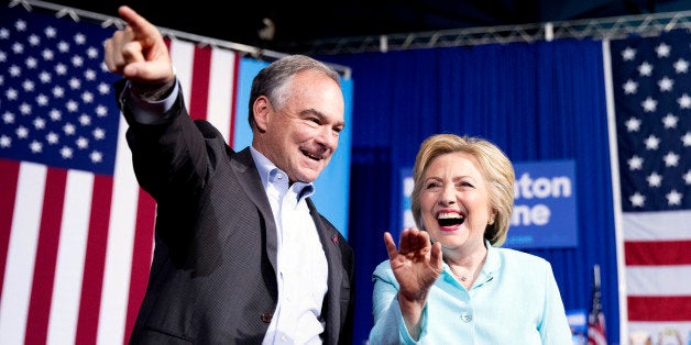 Democratic presidential candidate Hillary Clinton and Sen. Tim Kaine, D-Va., arrive at a rally at Florida International University Panther Arena in Miami, Saturday, July 23, 2016. Clinton has chosen Kaine to be her running mate. (AP Photo/Andrew Harnik)