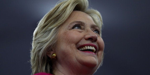 PHILADELPHIA, PA - JULY 29: Democratic presidential nominee former Secretary of State Hillary Clinton looks on during a campaign rally with democratic vice presidential nominee U.S. Sen. Tim Kaine (D-VA) at Temple University on July 29, 2016 in Philadelphia, Pennsylvania. A day after accepting the democratic presidential and vice presidential nominations at the Democratic National Convention, Hillary Clinton and Tim Kaine are kicking off a three-day bus tour through Pennsylvania and Ohio. (Photo by Justin Sullivan/Getty Images)