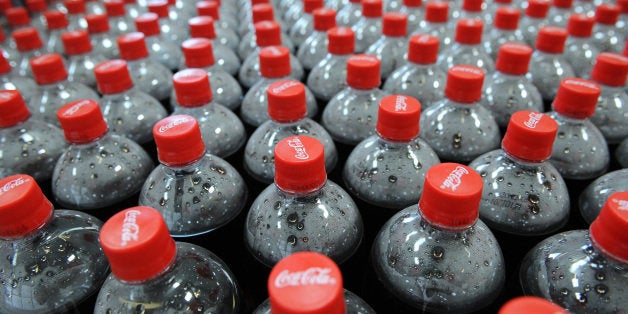 Picture taken on July 6, 2009 in Castanet-Tolosan shows Coca-Cola bottles on an assembly line at a Coca Cola bottling plant. AFP PHOTO / REMY GABALDA (Photo credit should read REMY GABALDA/AFP/Getty Images)