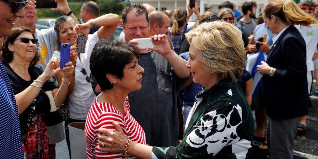 Democratic presidential nominee Hillary Clinton campaigns at Grandpa's Cheesebarn in Ashland, Ohio, U.S. July 31, 2016. REUTERS/Aaron P. Bernstein