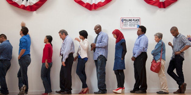 Voters waiting to vote in polling place