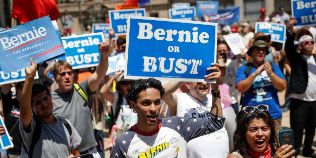 Supporters of Sen. Bernie Sanders, I-Vt., yell during a rally near City Hall in Philadelphia, Tuesday, July 26, 2016, during