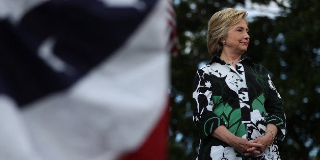 COLUMBUS, OH - JULY 31: Democratic presidential nominee former Secretary of State Hillary Clinton looks on during a campaign rally with democratic vice presidential nominee U.S. Sen Tim Kaine (D-VA) at Fort Hayes Vocational School on July 31, 2016 in Columbus, Ohio. Hillary Clinton and Tim Kaine are wrapping up their three-day bus tour through Pennsylvania and Ohio. (Photo by Justin Sullivan/Getty Images)