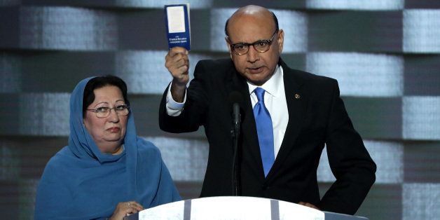 PHILADELPHIA, PA - JULY 28: Khizr Khan, father of deceased Muslim U.S. Soldier Humayun S. M. Khan, holds up a booklet of the US Constitution as he delivers remarks on the fourth day of the Democratic National Convention at the Wells Fargo Center, July 28, 2016 in Philadelphia, Pennsylvania. Democratic presidential candidate Hillary Clinton received the number of votes needed to secure the party's nomination. An estimated 50,000 people are expected in Philadelphia, including hundreds of protesters and members of the media. The four-day Democratic National Convention kicked off July 25. (Photo by Alex Wong/Getty Images)