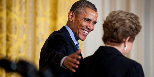Dilma Rousseff, Brazil's president, right, and U.S. President Barack Obama depart following a joint news conference in the East Room of the White House in Washington, D.C., U.S., on Tuesday, June 30, 2015. The U.S. and Brazil issued new commitments Tuesday to promote renewable energy and prevent deforestation, continuing momentum to address climate change leading into global talks later this year in Paris. Photographer: Pete Marovich/Bloomberg via Getty Images 