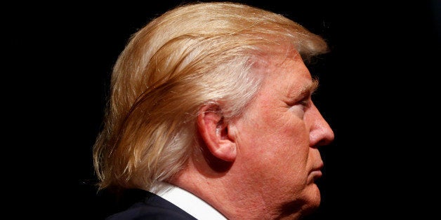 Republican U.S. Presidential nominee Donald Trump attends a campaign event at Briar Woods High School in Ashburn, Virginia, U.S. August 2, 2016. REUTERS/Eric Thayer