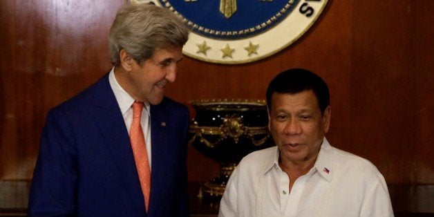 MANILA, PHILIPPINES - JULY 27 : Philippine President Rodrigo Duterte (R) greets U.S. Secretary of State John Kerry (L) during his visit at the Malacanang presidential palace in Manila, Philippines on Wednesday, July 27, 2016. (Photo by AP Photo/Aaron Favila/Pool/Anadolu Agency/Getty Images)