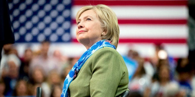 Democratic presidential candidate Hillary Clinton arrives to speak at a rally at Adams City High School in Commerce City, Colo., Wednesday, Aug. 3, 2016. (AP Photo/Andrew Harnik)