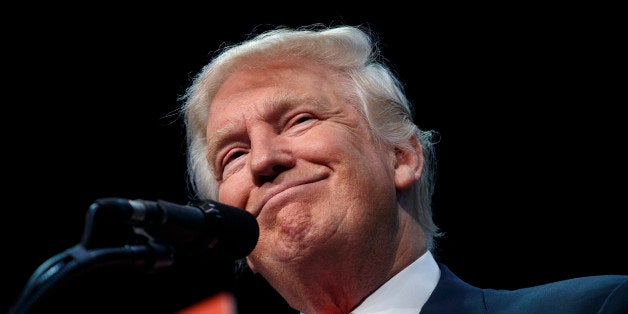 Republican presidential candidate Donald Trump smiles during a campaign town hall at Ocean Center, Wednesday, Aug. 3, 2016, in Daytona Beach, Fla. (AP Photo/Evan Vucci)