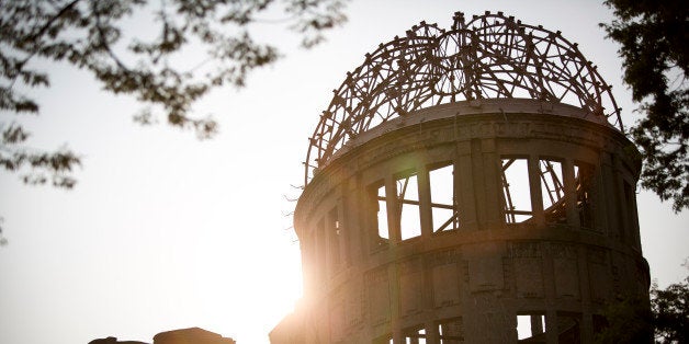 The Atomic Bomb Dome is seen at sunset in the Hiroshima Peace Memorial Park two days prior to 71st anniversary of the bombing