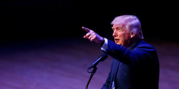 Republican U.S. Presidential nominee Donald Trump attends a campaign event at the Merrill Auditorium in Portland, Maine August 4, 2016. REUTERS/Eric Thayer