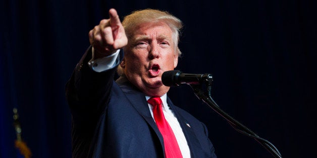 GREEN BAY, WI - AUGUST 05: Republican presidential candidate Donald Trump speaks at a rally on August 5, 2016 in Green Bay, Wisconsin. Trump endorsed House Speaker Paul Ryan, Sen. John McCain (R-AZ) and Sen. Kelly Ayotte (R-NH) during the rally in an effort to heal rifts within the Republican Party. (Photo by Darren Hauck/Getty Images)