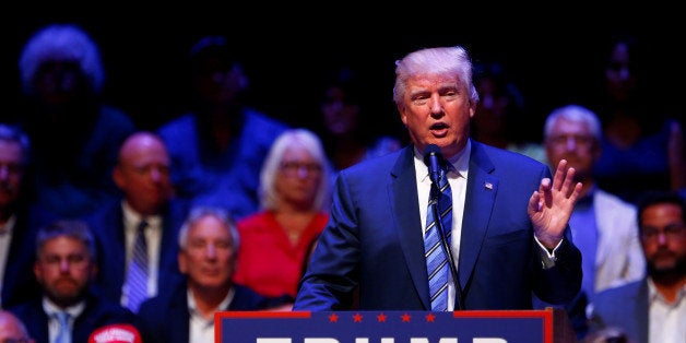 Republican U.S. Presidential nominee Donald Trump attends a campaign event at the Merrill Auditorium in Portland, Maine August 4, 2016. REUTERS/Eric Thayer