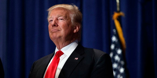 Republican presidential candidate Donald Trump pauses during a campaign rally, Friday, Aug. 12, 2016, in Altoona, Pa. (AP Photo/Evan Vucci)