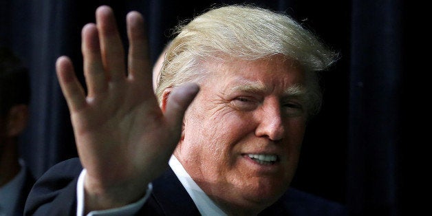 Republican presidential nominee Donald Trump leaves a campaign rally in Charlotte, North Carolina, U.S., August 18, 2016. REUTERS/Carlo Allegri