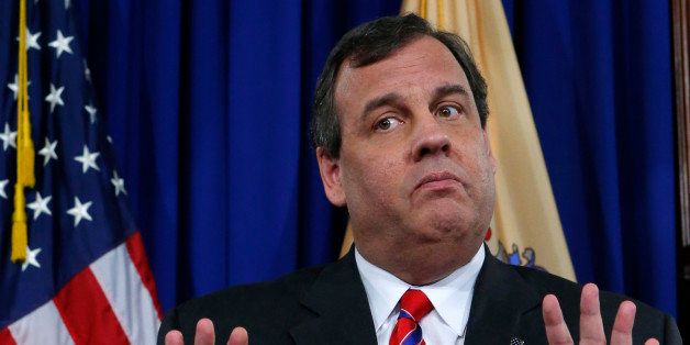 New Jersey Governor Chris Christie reacts to a question during a news conference after announcing the chairman of the Port Authority of New York and New Jersey had resigned, a day after an internal investigation cleared Christie in the "Bridgegate" scandal, during a news conference in Trenton, New Jersey, United States on March 28, 2014. REUTERS/Eduardo Munoz/File Photo