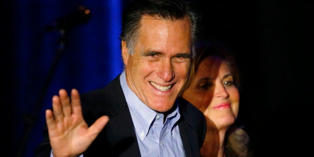 Former Republican presidential candidate Mitt Romney arrives with his wife Ann to speak at the Republican National Committee
