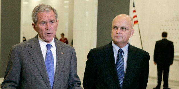 U.S. President George W. Bush (L) speaks next to Director of the CIA Gen. Michael Hayden at the CIA Headquarters in McLean, Virginia, after receiving a briefing on the Georgia/Russia military conflict, August 14, 2008. REUTERS/Larry Downing (UNITED STATES)