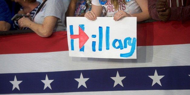 Hillary Clinton supporters wait for the chance to greet the U.S. Democratic presidential nominee during a rally at John Marsh