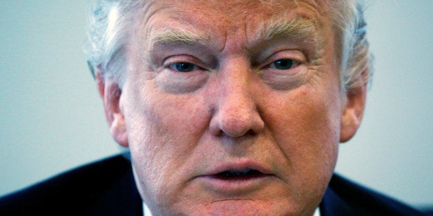 Republican presidential nominee Donald Trump speaks during a round table with the Republican Leadership Initiative at Trump Tower in the Manhattan borough of New York, U.S., August 25, 2016. REUTERS/Carlo Allegri