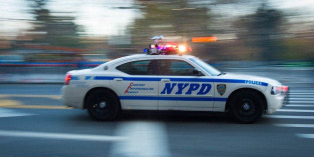 NYPD's units patrol 59th Street before the Macy's Thanksgiving Day Parade on Thursday, Nov. 26, 2015, in New York. (Photo by Scott Roth/Invision/AP)