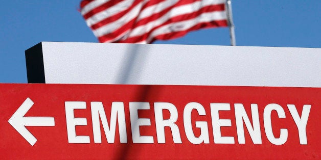 An entrance sign to the Texas Health Presbyterian Hospital is seen in Dallas, Texas, October 4, 2014. U.S. health officials have fielded inquiries about as many as 100 potential cases of Ebola since the first patient with the deadly virus was detected in the country, but no new infections have been identified, a senior health official said on Saturday. REUTERS/Jim Young (UNITED STATES - Tags: HEALTH DISASTER)