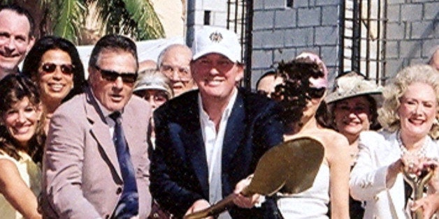 Portrait of American businessman Donald Trump, with a shovel, and unidentified others during the ground-breaking ceremony for