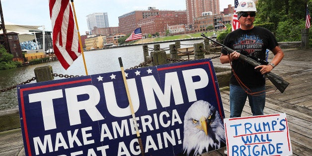 CLEVELAND, OH - JULY 18: A Donald Trump supporter attends a rally for Trump on the first day of the Republican National Convention (RNC) on July 18, 2016 in downtown Cleveland, Ohio. An estimated 50,000 people are expected in downtown Cleveland, including hundreds of protesters and members of the media. The convention runs through July 21. (Photo by Spencer Platt/Getty Images)