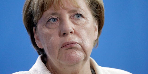 German Chancellor Angela Merkel attends a joint news conference as part of a meeting with the President of Turkmenistan, Gurbanguly Berdimuhamedow at the chancellery in Berlin, Germany, Monday, Aug. 29, 2016. (AP Photo/Michael Sohn)