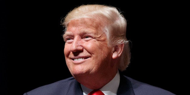 Republican presidential candidate Donald Trump smiles during a town hall, Tuesday, Sept. 6, 2016, in Virginia Beach, Va. (AP Photo/Evan Vucci)