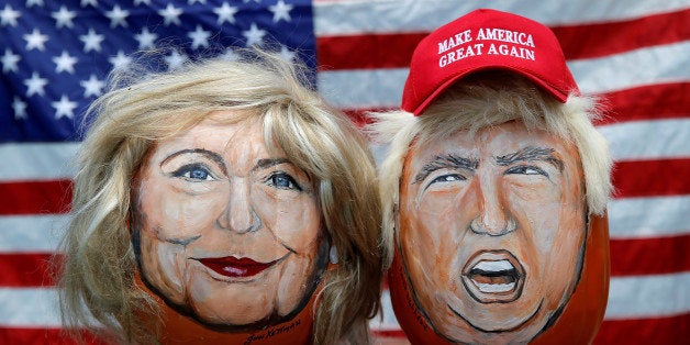 The images of U.S. Democratic presidential candidate Hillary Clinton (L) and Republican Presidential candidate Donald Trump are seen painted on decorative pumpkins created by artist John Kettman in LaSalle, Illinois, U.S., June 8, 2016. REUTERS/Jim Young TPX IMAGES OF THE DAY
