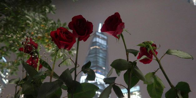 NEW YORK, NY - SEPTEMBER 9: Roses are left in front of One World Trade Center at the national 9/11 Memorial in advance of the 15th anniversay of the 9/11 attacks on the World Trade Center on September 9, 2016 in New York City. (Photo by Gary Hershorn/Getty Images)