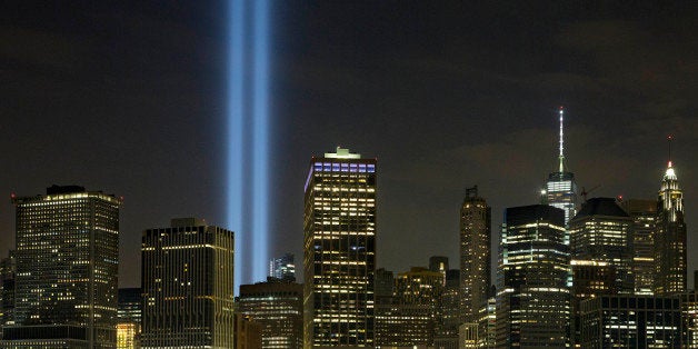 The Tribute in Light rises above the lower Manhattan skyline, Saturday, Sept. 10, 2016, in New York. Sunday marks the fifteen