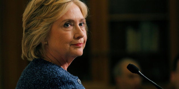 U.S. Democratic presidential candidate Hillary Clinton speaks to reporters after holding a "National Security Working Session