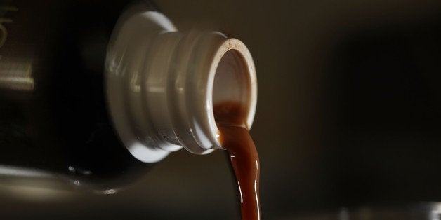 MIAMI, FL - MAY 10: In this photo illustration, a liquid form of the herbal supplement Kratom is poured from a bottle on May 10, 2016 in Miami, Florida. The herbal supplement is a psychoactive drug derived from the leaves of the kratom plant and it's been reported that people are using the supplement to get high and some states are banning the supplement. (Photo by Joe Raedle/Getty Images)