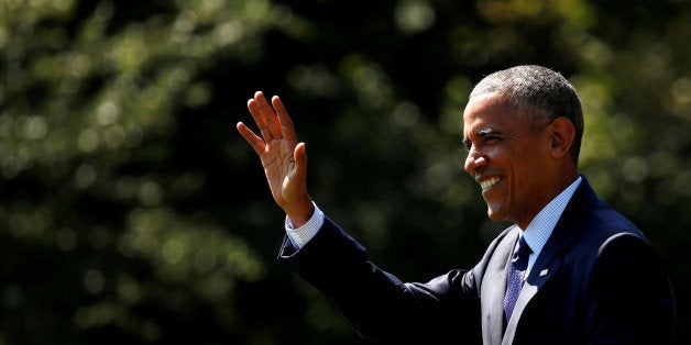 U.S. President Barack Obama waves as he departs the White House in Washington, U.S., September 13, 2016. REUTERS/Kevin Lamar
